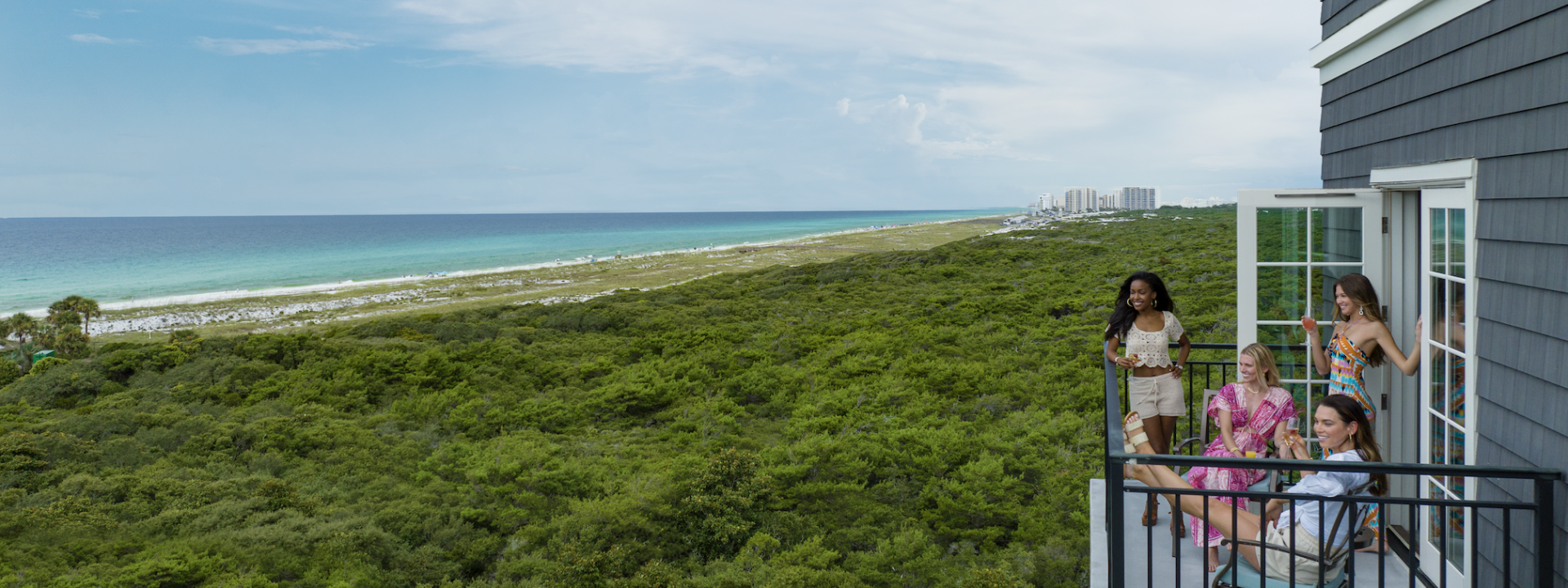 Four women on balcony