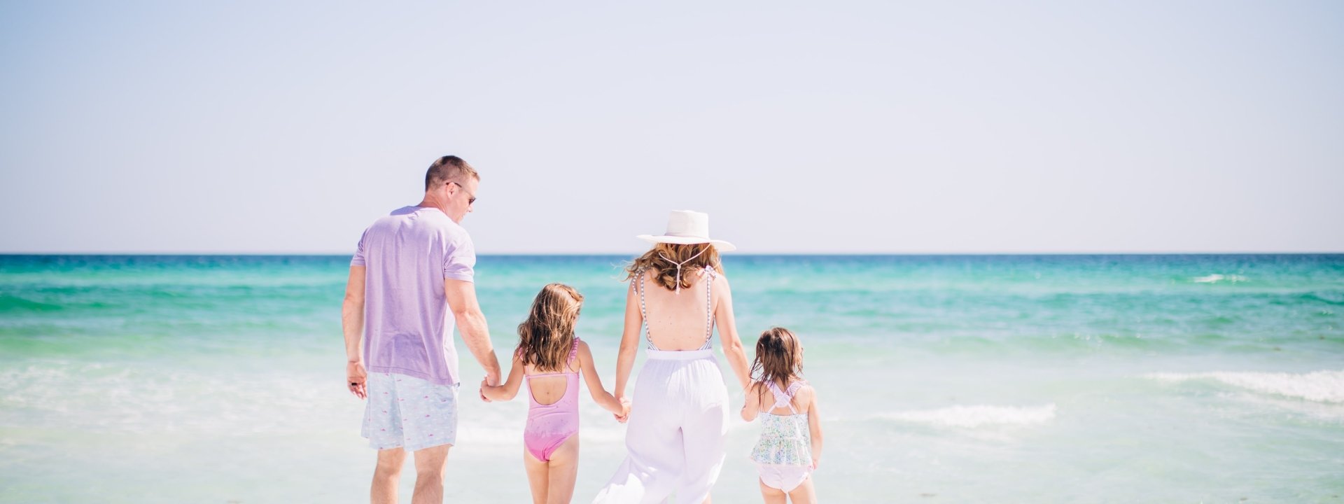 family of four on beach