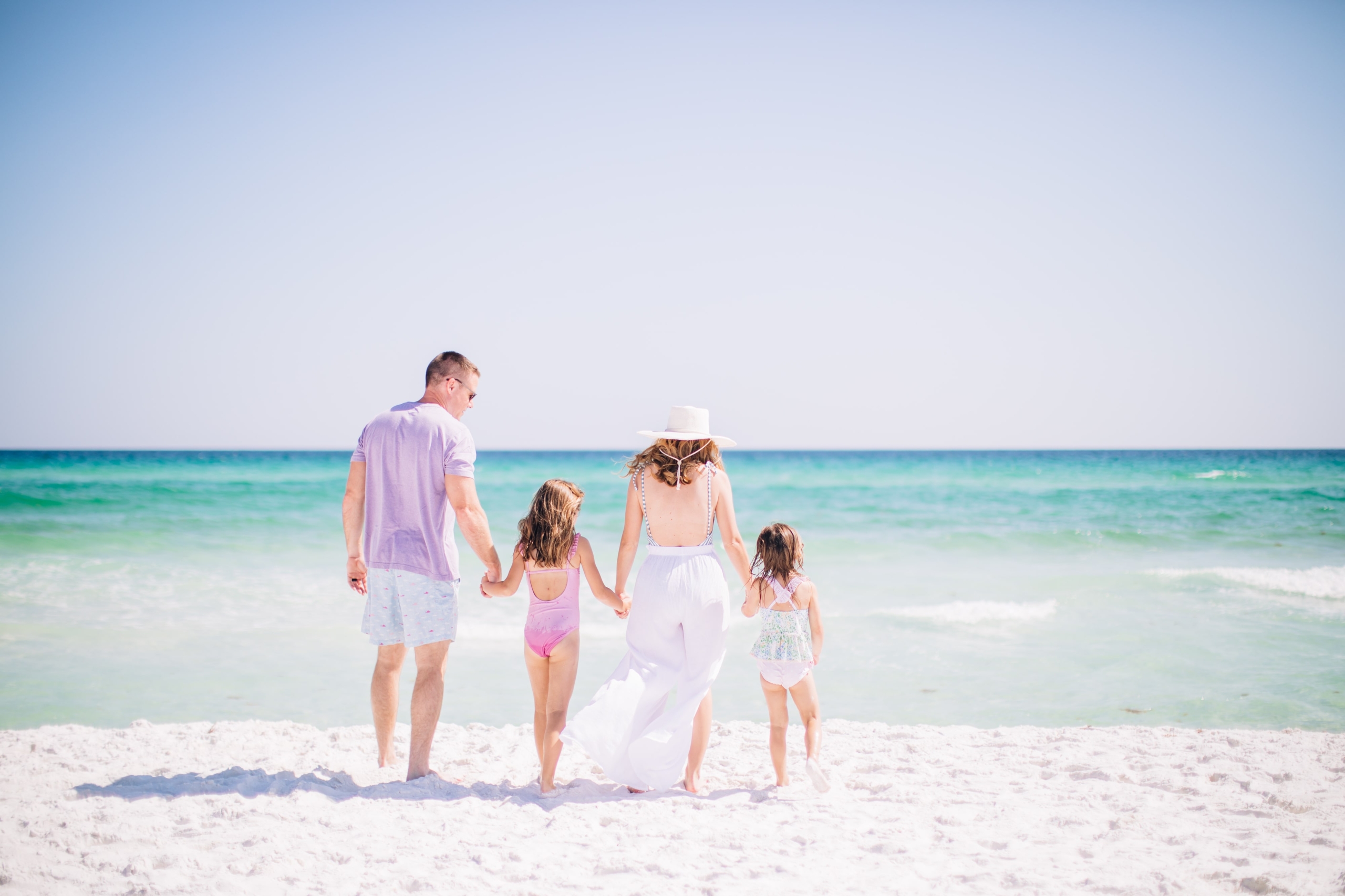 family of four on beach