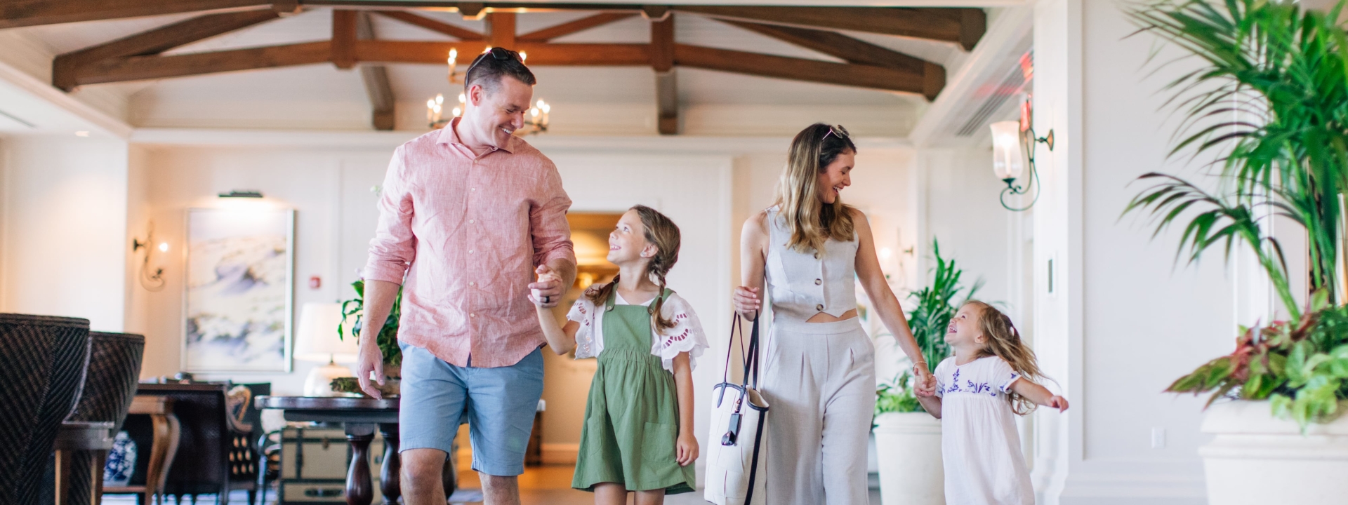 family of four in hotel lobby