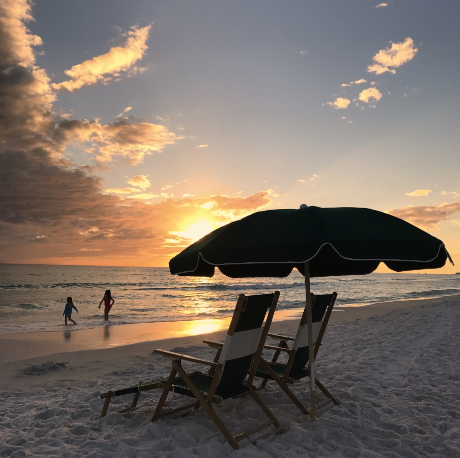 beach chairs at sunset